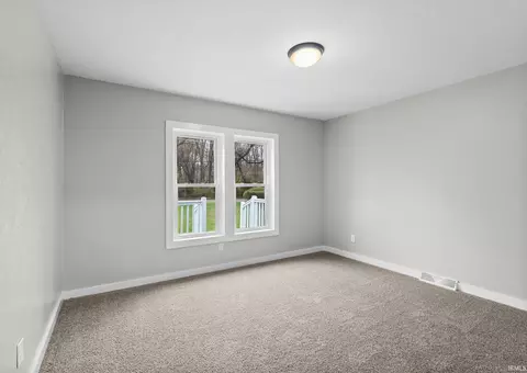 Bedroom - 8930 E Crow Rd, Syracuse, IN 46567 photo 2 of 5