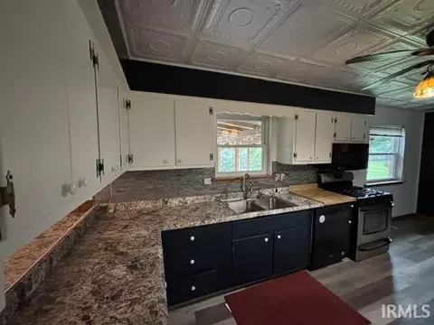 Kitchen - 1009 E 7th St, Fowler, IN 47944 photo 2 of 3