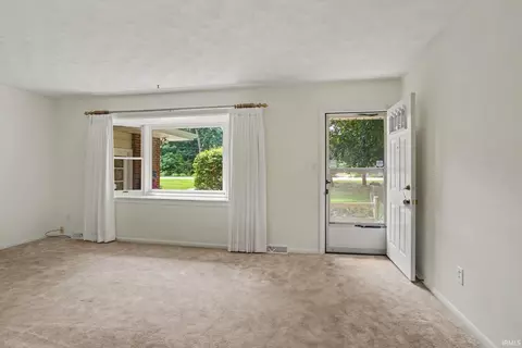 Living - 51678 Grape Rd, Granger, IN 46530 photo 1 of 3