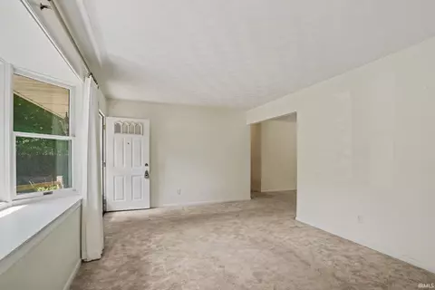 Living - 51678 Grape Rd, Granger, IN 46530 photo 2 of 3
