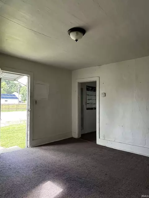 Living - 115 E Walnut St, Odon, IN 47562 photo 2 of 2