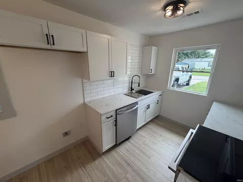 Kitchen - 405 Dean St, Mitchell, IN 47446 photo 2 of 2