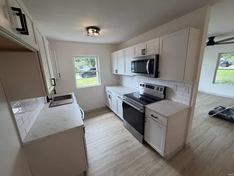Kitchen - 405 Dean St, Mitchell, IN 47446 photo 1 of 2