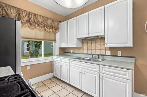 Kitchen - 309 E Walnut St, Chalmers, IN 47929 photo 2 of 3