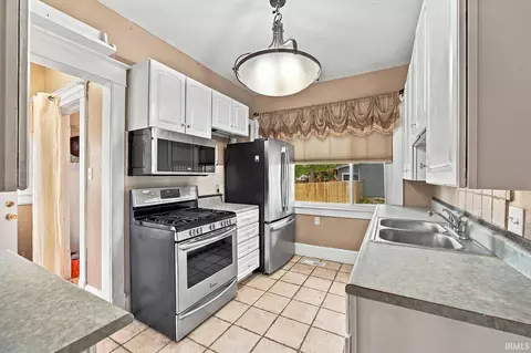 Kitchen - 309 E Walnut St, Chalmers, IN 47929 photo 1 of 3