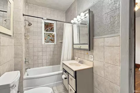Bath - 309 E Walnut St, Chalmers, IN 47929 photo 1 of 2