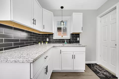 Kitchen - 735 Porter St, Gary, IN 46406 photo 3 of 4