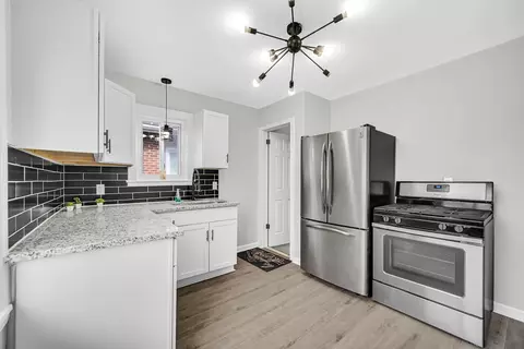 Kitchen - 735 Porter St, Gary, IN 46406 photo 2 of 4