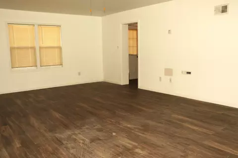 Living - 1120 E 39th Pl, Griffith, IN 46319 photo 2 of 3