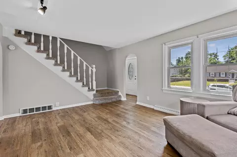 Living - 1202 E Lake St, Griffith, IN 46319 photo 3 of 3