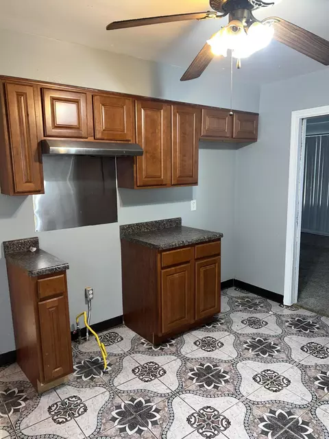Kitchen - 409 W 20th Pl, Gary, IN 46407 photo 2 of 2