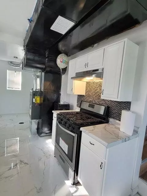 Kitchen - 1039 E 35th Ct, Gary, IN 46409 photo 2 of 2