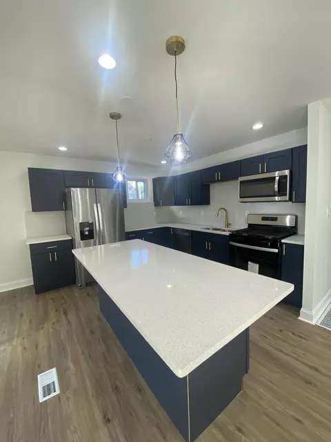 Kitchen - 706 E 40th Pl, Griffith, IN 46319 photo 2 of 2