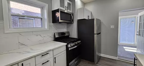 Kitchen - 411 Lincoln St, Gary, IN 46402 photo 5 of 7