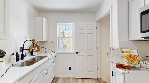 Kitchen - 900 E 44th Pl, Gary, IN 46409 photo 1 of 2