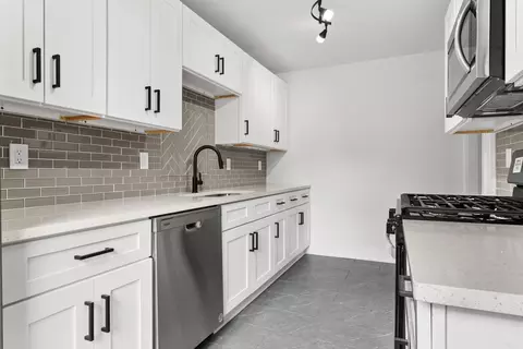 Kitchen - 556 Ellsworth St, Gary, IN 46404 photo 3 of 3