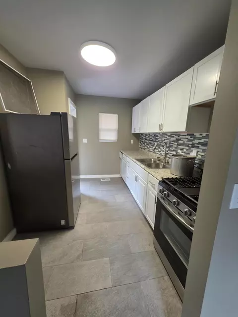 Kitchen - 1103 E Ridge Rd, Gary, IN 46409 photo 2 of 2
