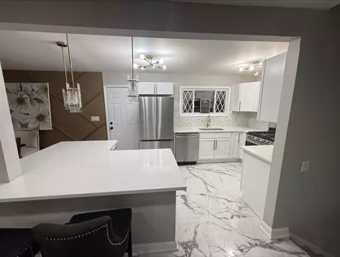 Kitchen - 7033 E 1st Ave, Gary, IN 46403 photo 1 of 3