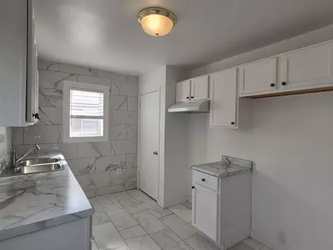 Kitchen - 908 E 45th Ave, Gary, IN 46409 photo 2 of 2
