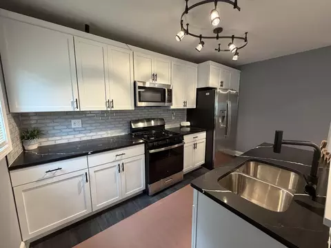 Kitchen - 556 Durbin St, Gary, IN 46406 photo 2 of 2