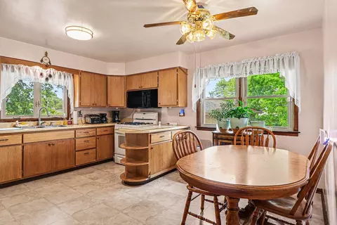 Kitchen - 305 W 35th Ave, Griffith, IN 46319 photo 1 of 2
