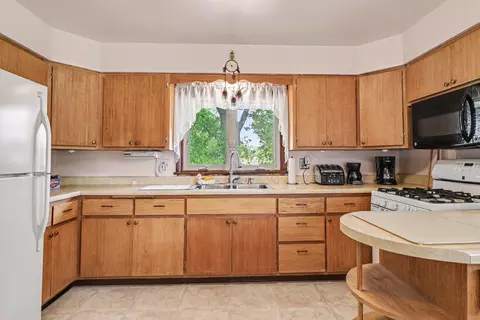 Kitchen - 305 W 35th Ave, Griffith, IN 46319 photo 2 of 2