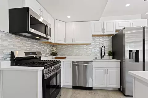 Kitchen - 553 555 Rhode Island Ct, Gary, IN 46402 photo 2 of 6
