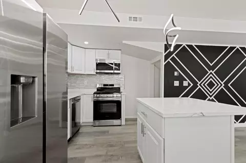 Kitchen - 553 555 Rhode Island Ct, Gary, IN 46402 photo 4 of 6