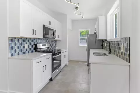 Kitchen - 2107 W 8th Ave, Gary, IN 46404 photo 1 of 2