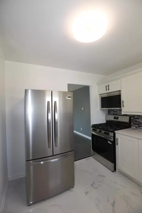 Kitchen - 1125 Clinton St, Gary, IN 46406 photo 2 of 2