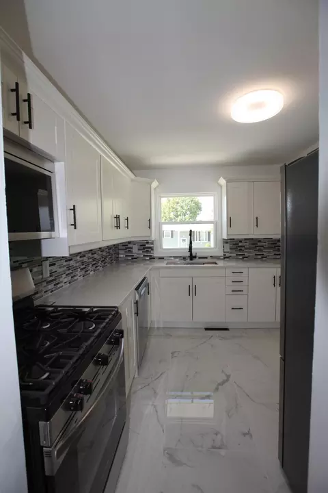 Kitchen - 1125 Clinton St, Gary, IN 46406 photo 1 of 2