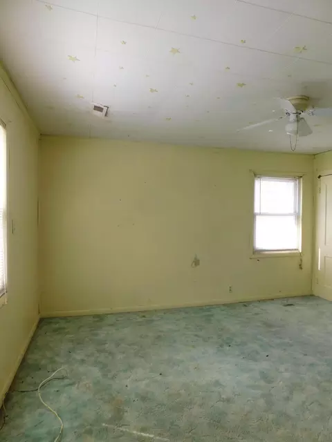 Bedroom - 315 E Main St, Lynch, KY 40855 photo 2 of 18