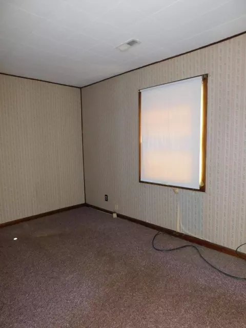 Bedroom - 315 E Main St, Lynch, KY 40855 photo 8 of 18