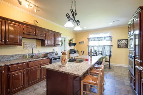 Kitchen - 320 Alice Roy Rd, Windsor, KY 42565 photo 4 of 10
