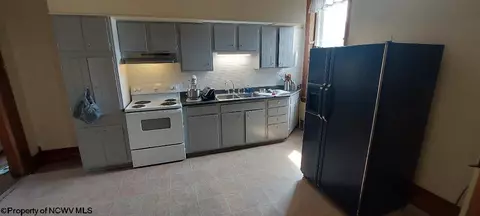 Kitchen - 100 E Main St, Mannington, WV 26582 photo 1 of 2