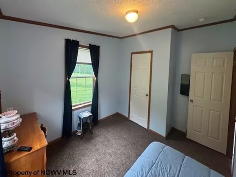 Bedroom - 1683 Range Rd, Wadestown, WV 26590 photo 2 of 6