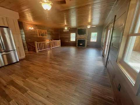 Living - 482 E Side River Rd, Milan, NH 03588 photo 2 of 5