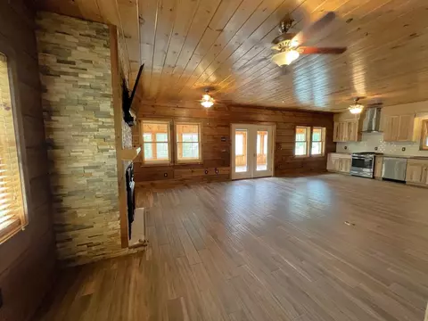 Living - 482 E Side River Rd, Milan, NH 03588 photo 3 of 5