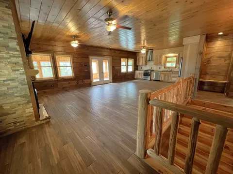 Living - 482 E Side River Rd, Milan, NH 03588 photo 4 of 5