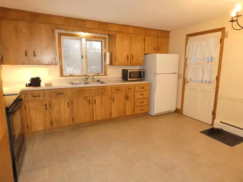Kitchen - 107 Middle Rd, Tuftonboro, NH 03816 photo 3 of 4