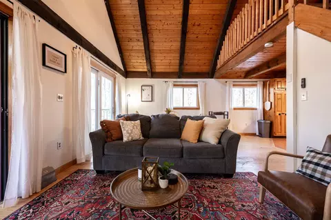 Living - 135 Pine River Path, Effingham, NH 03882 photo 1 of 5