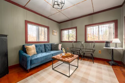 Living - 135 Pine River Path, Effingham, NH 03882 photo 3 of 5