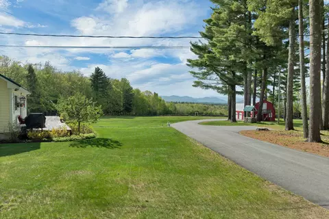 Exterior - 65 Effingham Rd, Ossipee, NH 03864 photo 5 of 17