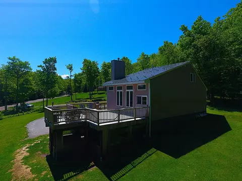 Exterior - 38 Poplar Dr, Jay, VT 05859 photo 4 of 10