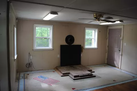 Living - 110 Elm St, Ossipee, NH 03864 photo 1 of 2