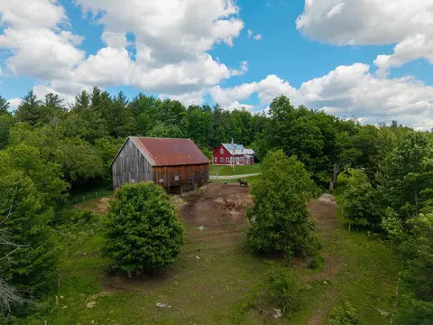 Exterior - 66 Downing Rd, Lunenburg, VT 05906 photo 10 of 12