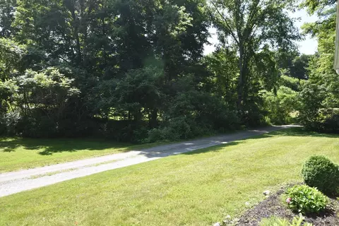 Exterior - 66 Hemmsted Cir, Castleton, VT 05732 photo 7 of 8