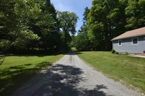 Exterior - 66 Hemmsted Cir, Castleton, VT 05732 photo 2 of 7