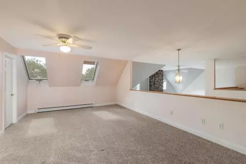 Living - 33 Wintercroft Cir #5, Grantham, NH 03753 photo 8 of 11