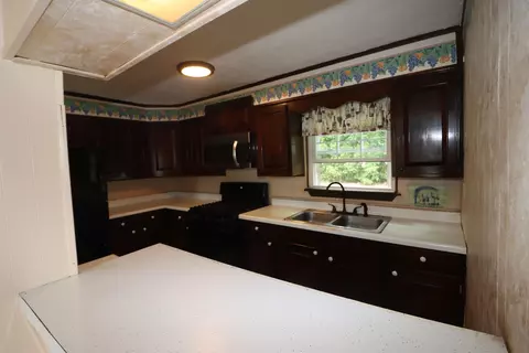 Kitchen - 95-97 Lancaster Rd, Gorham, NH 03581 photo 3 of 8